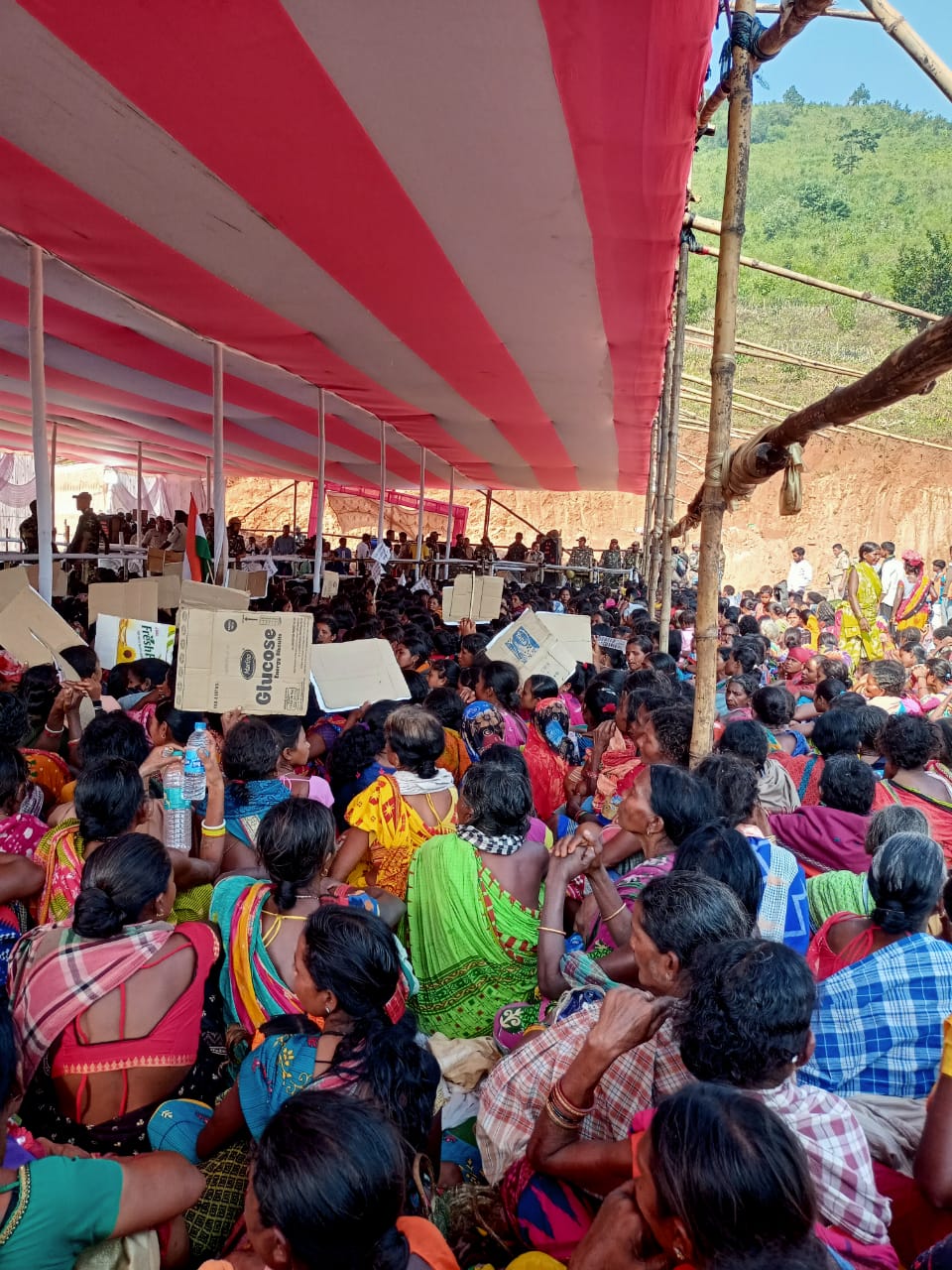 The tribals protesting against the mining during the public hearing