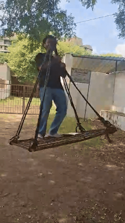 the video has Deepanshu swinging on the swing while the kids are watching standing on the side, its a funny social interaction