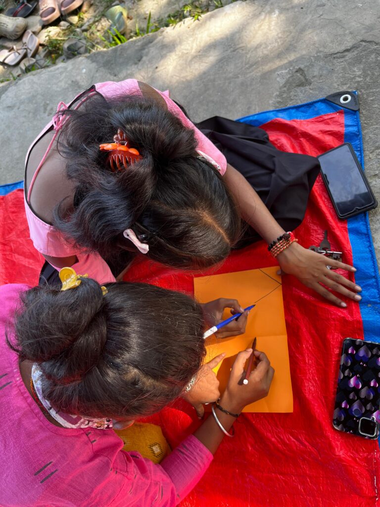 I clicked this at the start of the activity. Nothing fancy about this. Just two people trying to draw mountains.